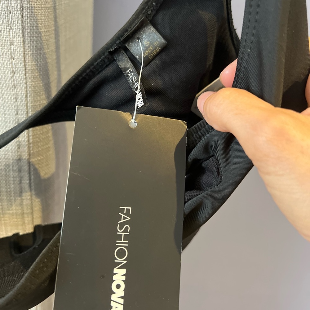 This swimsuit in black brand new with tag